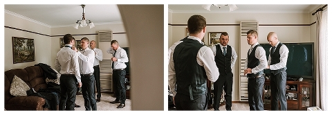 Groom getting ready for wedding and getting waistcoat adjusted