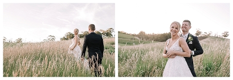 Bride and groom walking in long grass
